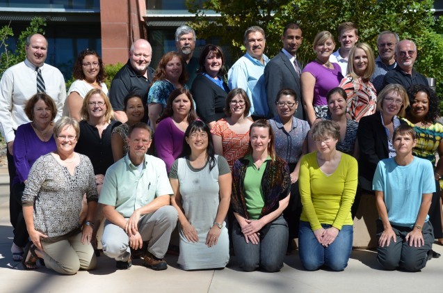 Large group of people posing for camera
