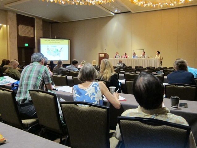 View of a room full of people attending a conference