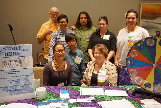 PBTRC staff manning a booth