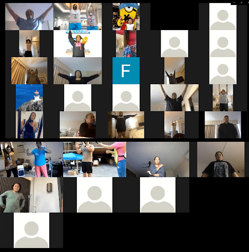 Screenshot of Zoom teleconference with people standing
